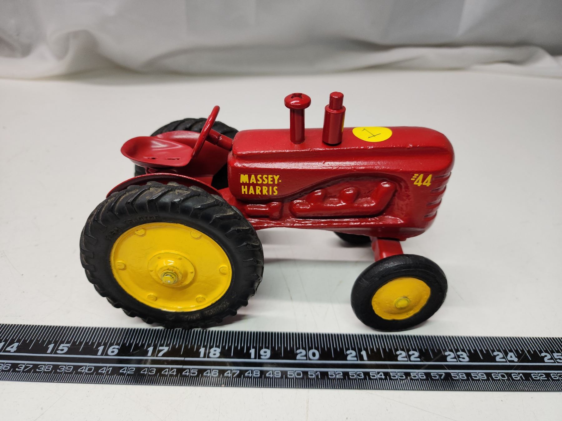 1950s Massey Harris 44 Red Die cast Model Tractor Schmalz Auctions 1950s-massey-harris-44-red-die-cast-model-tractor-schmalz-auctions