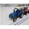 Image 2 : 2 toy tractors - pink tractor is ERTL
