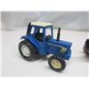 Image 3 : 2 toy tractors - pink tractor is ERTL