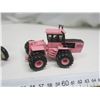 Image 5 : 2 toy tractors - pink tractor is ERTL