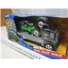 Image 2 : Hot Wheels Monster Jam travel treads hauler in original package