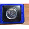 Image 1 : 1975 Voyageur Nickel Dollar. Specimen. Housed in its original Royal Canadian Mint blue clamshell cas
