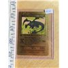 Image 1 : Shining Charizard gold metal Pokémon card