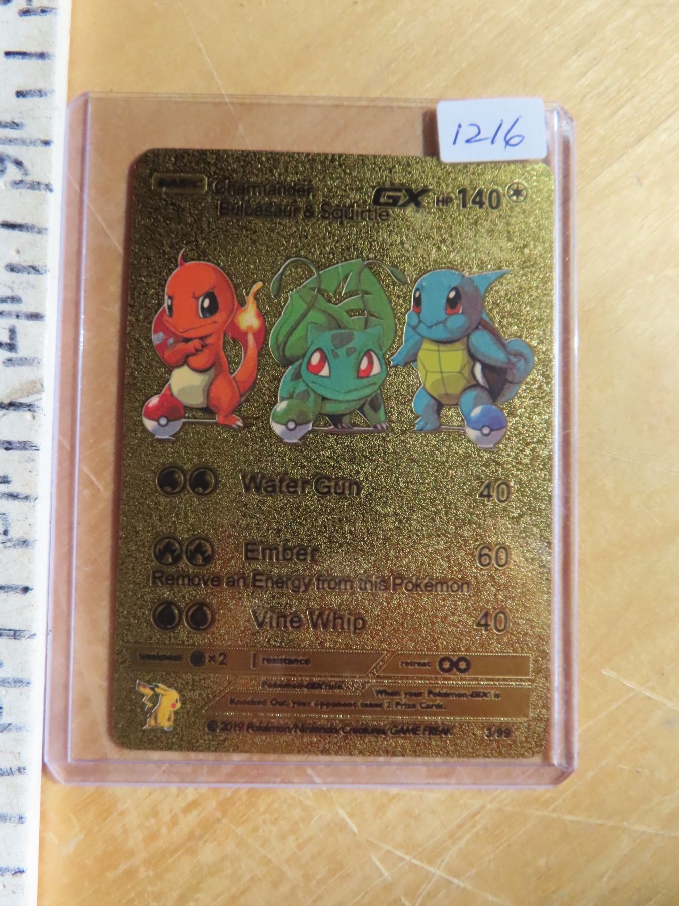 Charmander, Bulbasaur & Squirtle GX gold metal Pokmon card - Schmalz Auctions Charmander, Bulbasaur & Squirtle GX gold metal Pokmon card - Schmalz Auctions