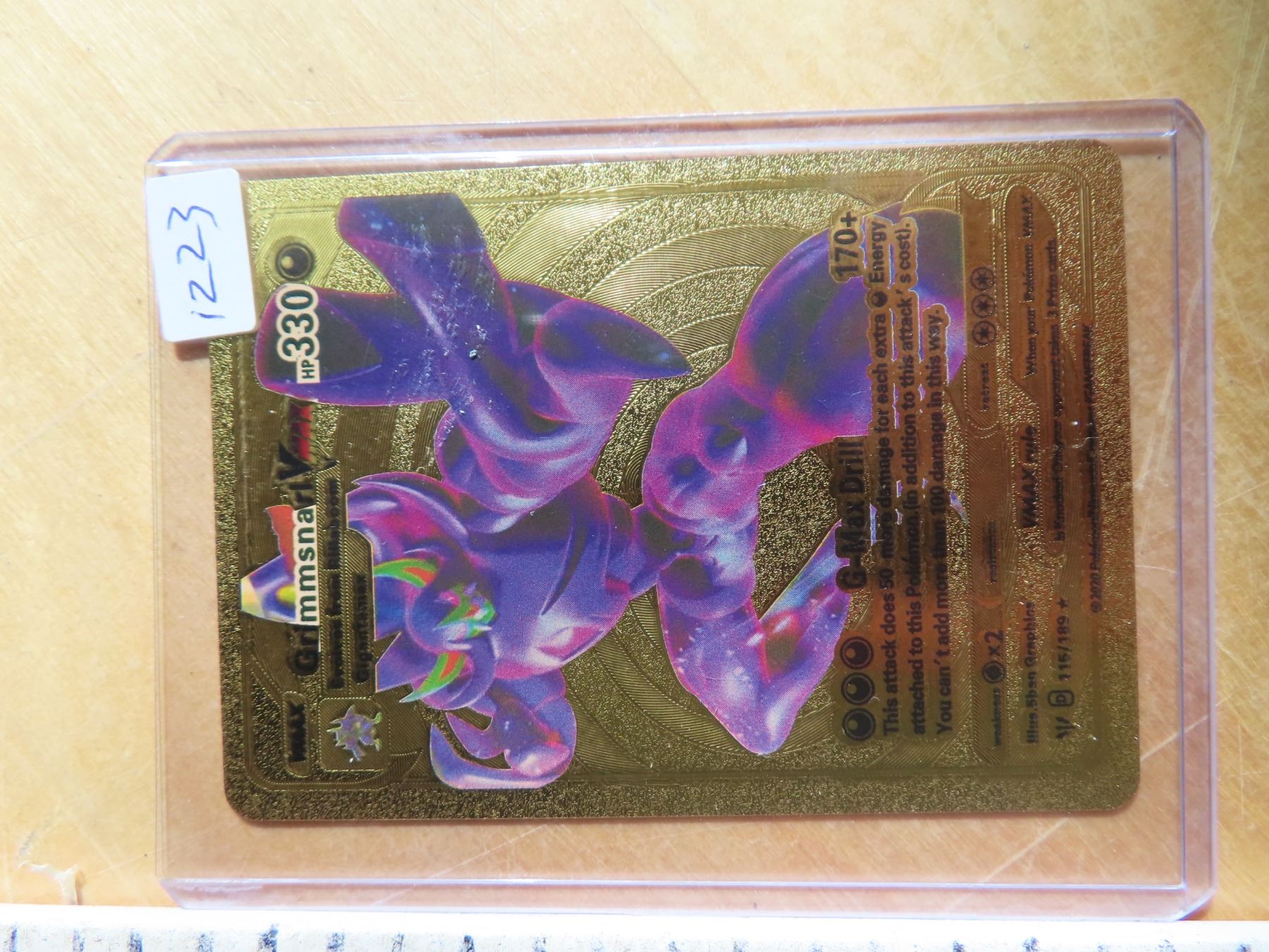 grimmsnarl gold pokemon card Pokemon Grimmsnarl VMAX 330HP Gold Foil Card 115/189 NM