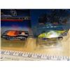 Image 2 : 4 Hot wheels cars in original packaging 1986 Turboa, 1997 Tow Jam and Barracuda, 2010 Mustang Concep