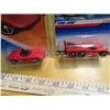 Image 3 : 4 Hot wheels cars in original packaging 1986 Turboa, 1997 Tow Jam and Barracuda, 2010 Mustang Concep