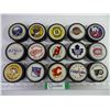 Image 1 : (15) NHL Team Pucks