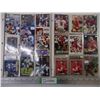 Image 1 : (2) Folders of Cards Featuring NFL Players Steve Young and Michael Irvin