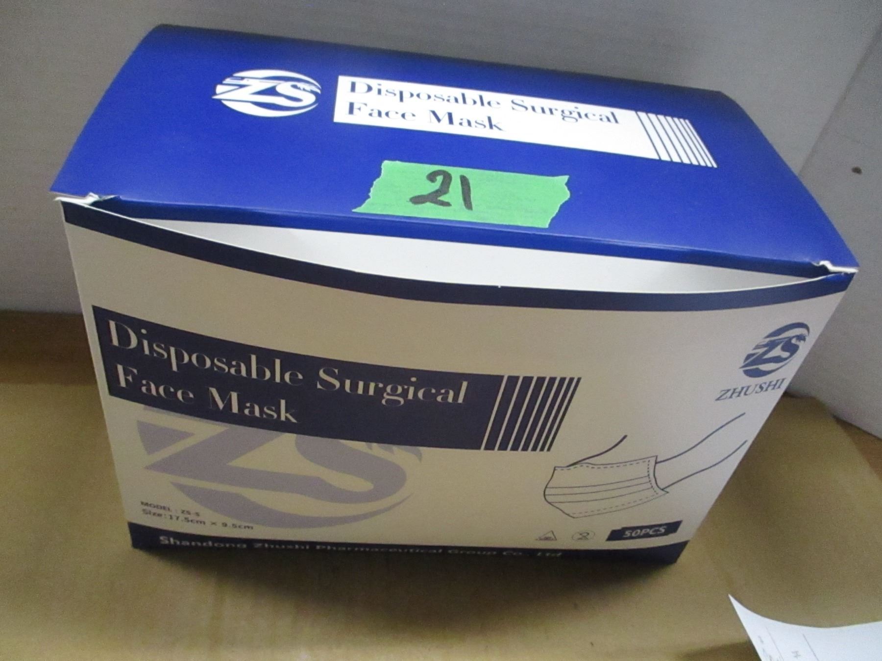 INSURANCE CLAIM (AS IS): BOX C/W 50 DISPOSIBLE SURGICAL FACE MASKS