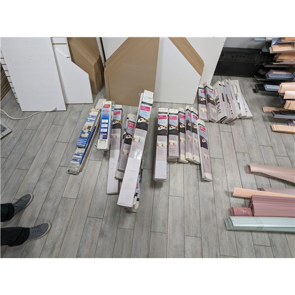 Group of 35  boxes Mini Blinds - on floor