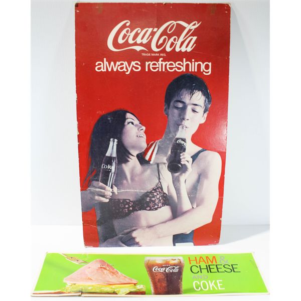 1970'S COCA COLA CARDBOARD AD SIGNS