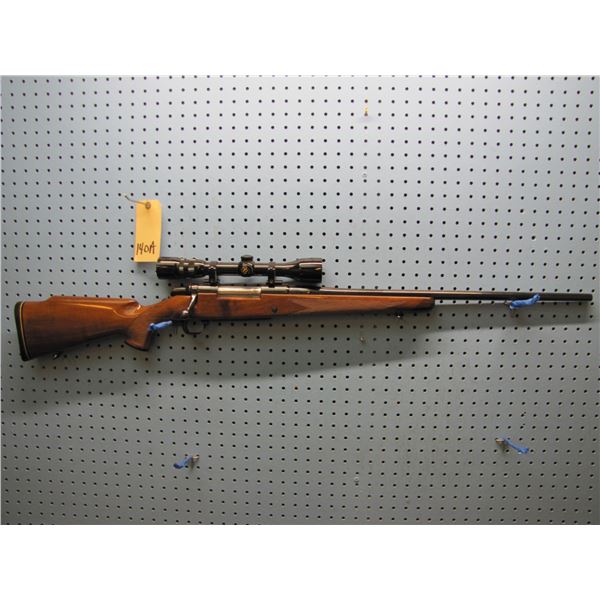 Browning , 7MM Rem mag, bolt action,  Hinge clip, made in Japan with Bushnell wide angle 3X9 scope ,