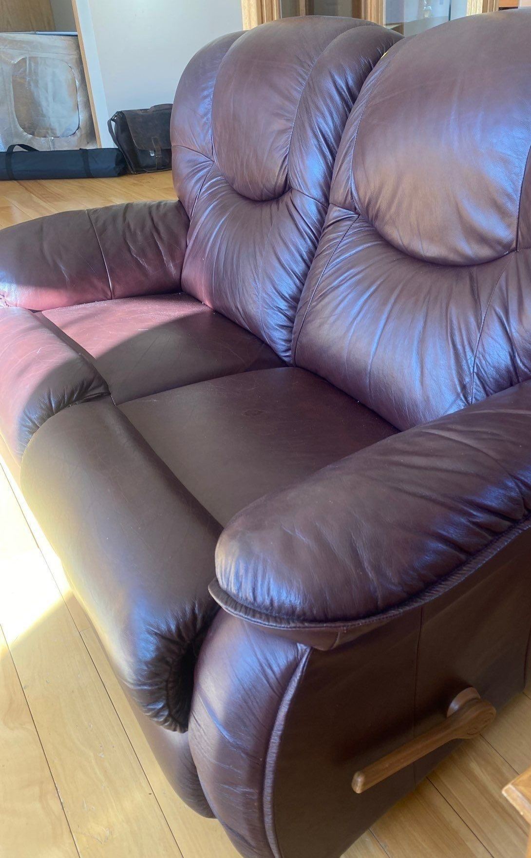 Leather Lazyboy Manual Reclining Loveseat 63 x 35 x 40 Beck Auctions Inc.