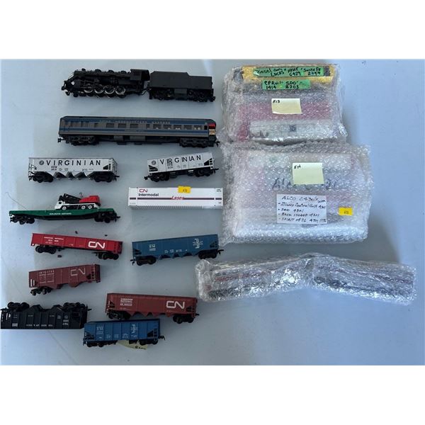 Collection of Train Parts and Cars with mystery stack to surprise the collector