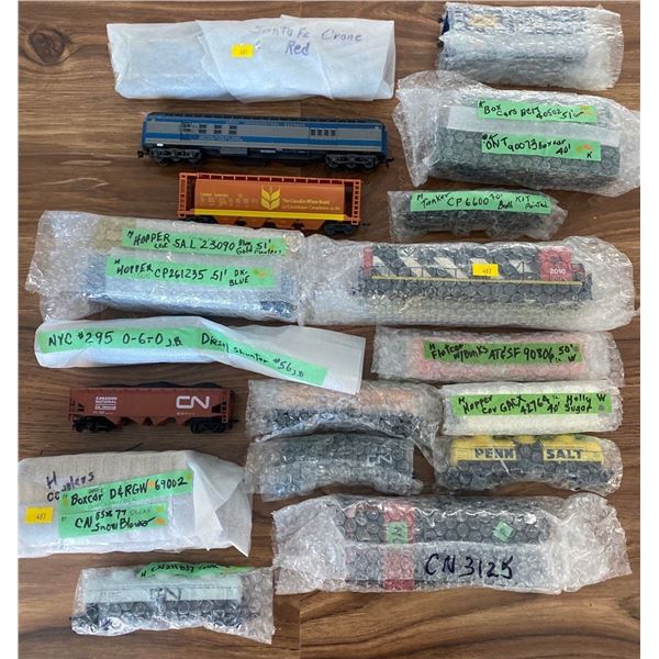 Train Engines and Assortment of HO scale Train Parts and Accessories