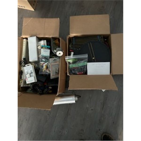 Assortment of Boxed Model Train Parts