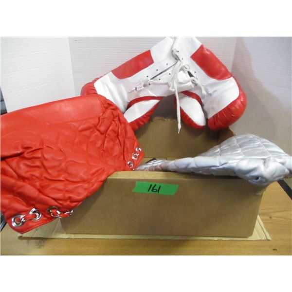 FREIGHT DAMAGE (AS IS):  BOX C/W BOXING GLOVES, PURSES, ETC