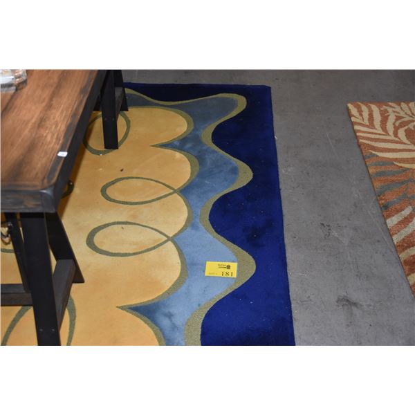 NEW ZEALAND WOOL RUG, "RYTHMIC" PATTERN; SIGNED (58" X 84")