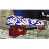 Image 2 : 4 BRASS - STRING UKULELE