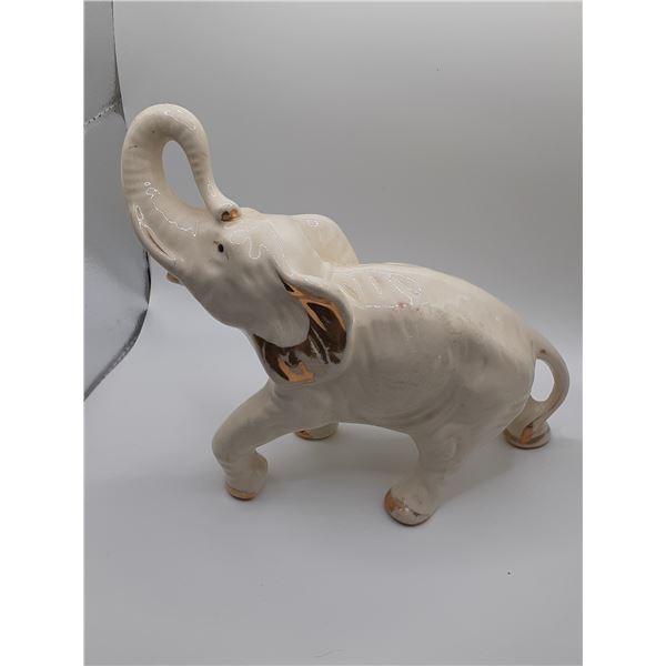 VintageWhite and gold porcelain Elephant