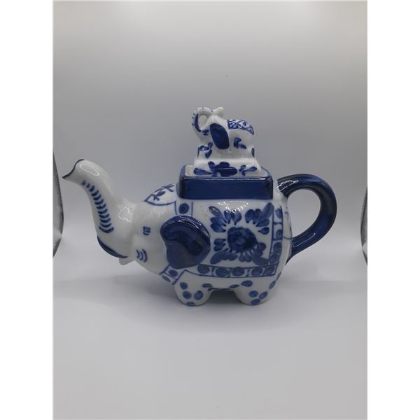 vintage hand painted blue and white porcelain teapot in elephant shape