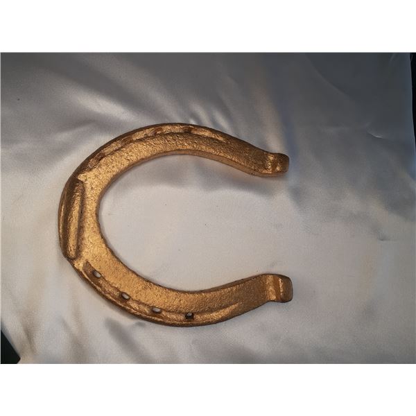 Vintage original horseshoe coloured in gold tone