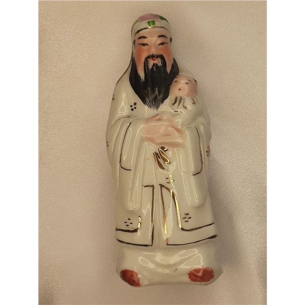 Vintage porcelain Asian Emperor figurine