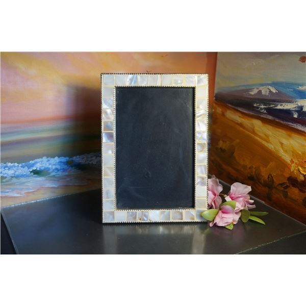 Vintage table photo frame decorated with mother of pearls