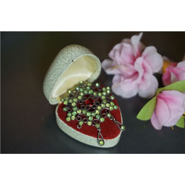 Antique Russian silver brooch with paste peridot and garnet