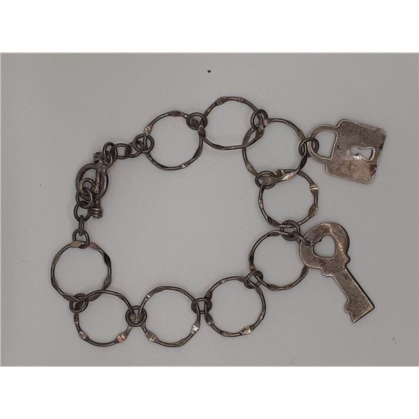 Vintage silver bracelet with key and padlock
