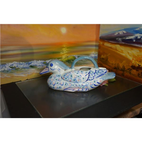 Vintage porcelain duck shaped water can