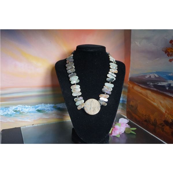 Vintage necklace with abalone beads and earth color round pendant