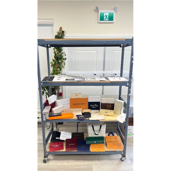 SHELFS OF DESIGNER PACKAGING, BAGS, BOXES FROM BRANDS SUCH AS LOUIS VUITTON, TIMED GOLD, LUGARO,