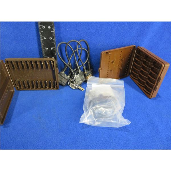 4 Cable Locks, 1 New Trigger Lock and 2 Cartridges Cases