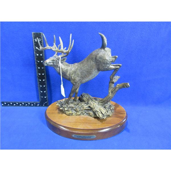 "Breakin' Thru Timber" Statue by Bradford Williams