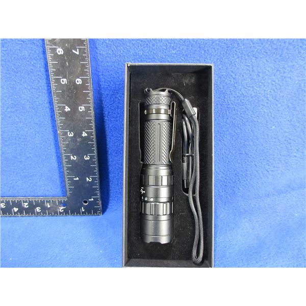 NEW - LED Flashlight with 4 Brightness and a Flash Setting