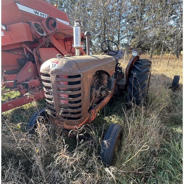 Old 44 Massey Tractor - was running when parked.