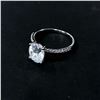 Image 2 : GRA certified oval cut moissanite VVS D weighing an estimated 3.00 carat w/18 round cubic zirconium