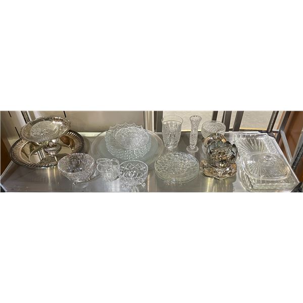 shelf lot of assorted glassware