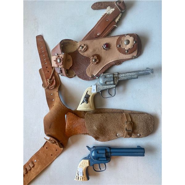 Daisy Capgun And Hubley Capgun With Leather Holsters