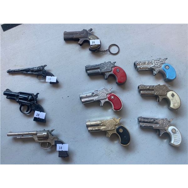 Assortment Of One Shot Derringer Capguns And Assortment Of Replica Mini Guns