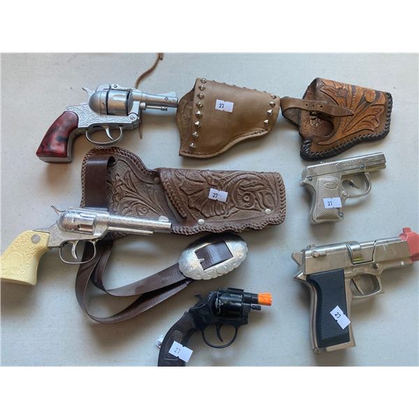 Assortment Of Western Style Capguns With Leather holsters