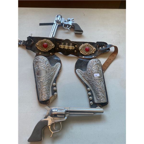Set Of Vintage Range Rider Capguns With Metal And Leather Holster