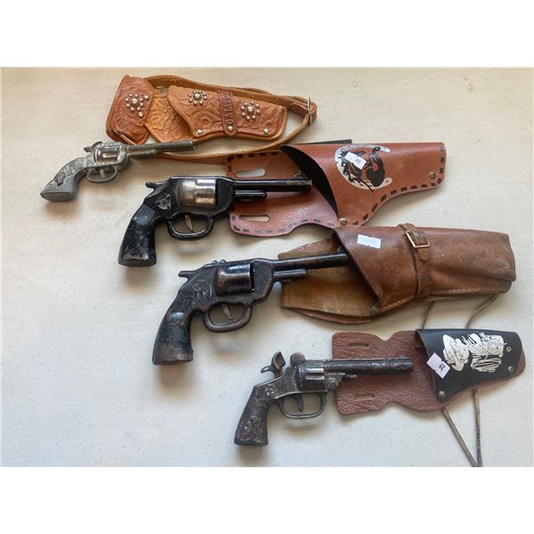 Assortment Of Vintage Collectable Capguns With Leather Holsters (Sold As Is)