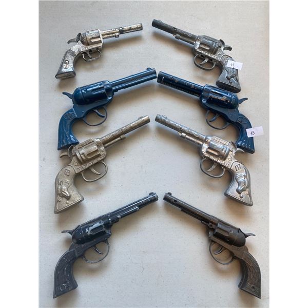 3 Texas Capguns And 4 Misc Western Style Capguns