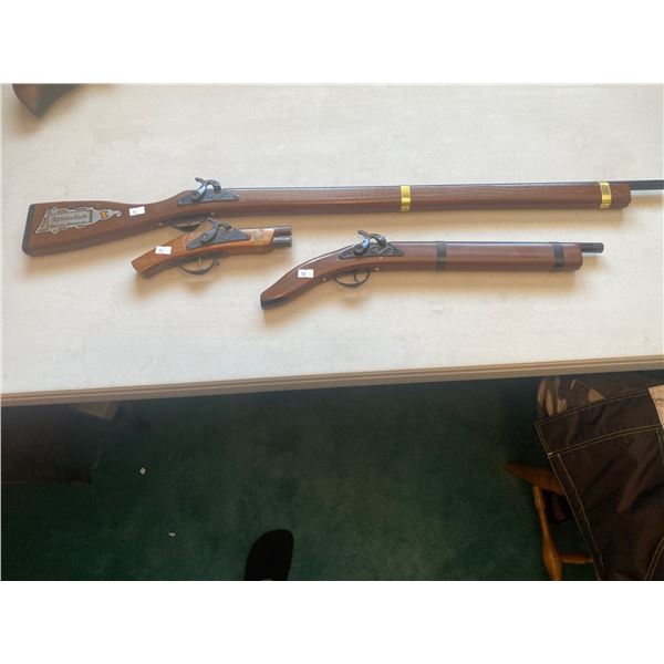 Three Decorative Wooden Gun Replicas