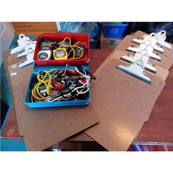 Collection Of Coaching Supplies, Clipboards, Whistles, And Stopwatches