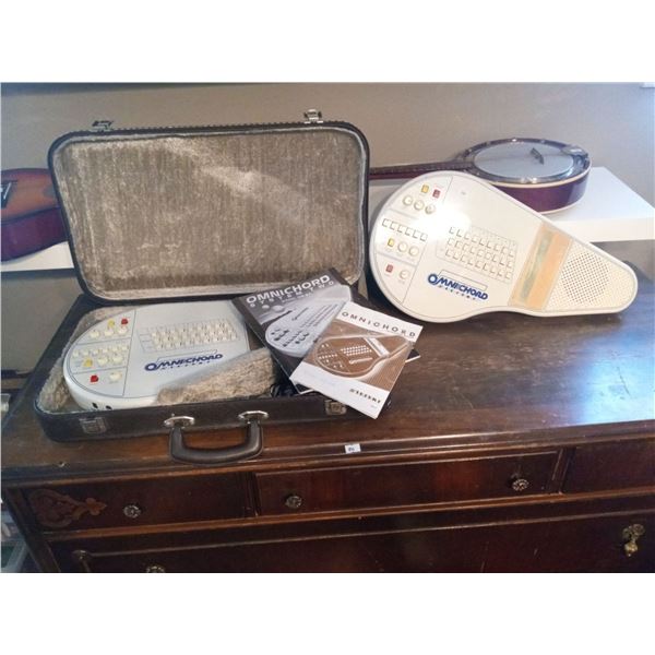 Set Of Suzuki Manicords One With Case And Cable