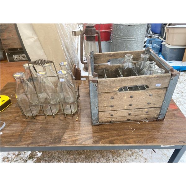 Assortment Of Vintage Milk Bottles And Carrying Cases